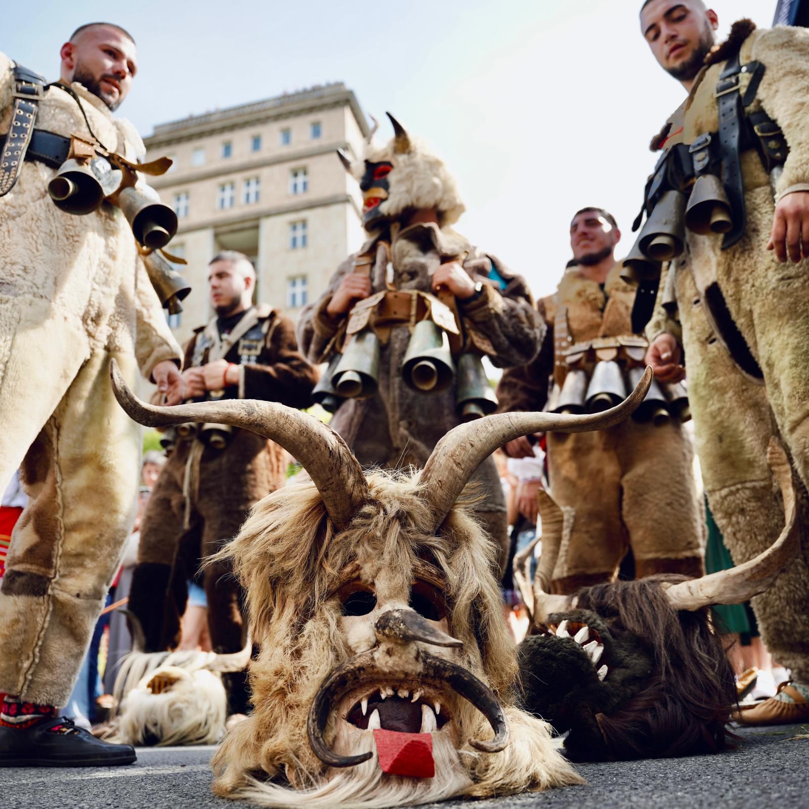 Bulgarian Kuker performers in horned masks and bells at Karneval der Kulturen Berlin